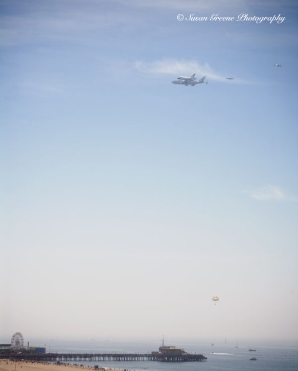 space shuttle and 747 in flight over Santa Monica pier